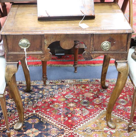 A walnut side table / lowboy, 18th century and later, on cabriole legs W.68cm